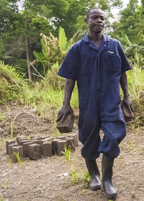 Ivan carrying mulch